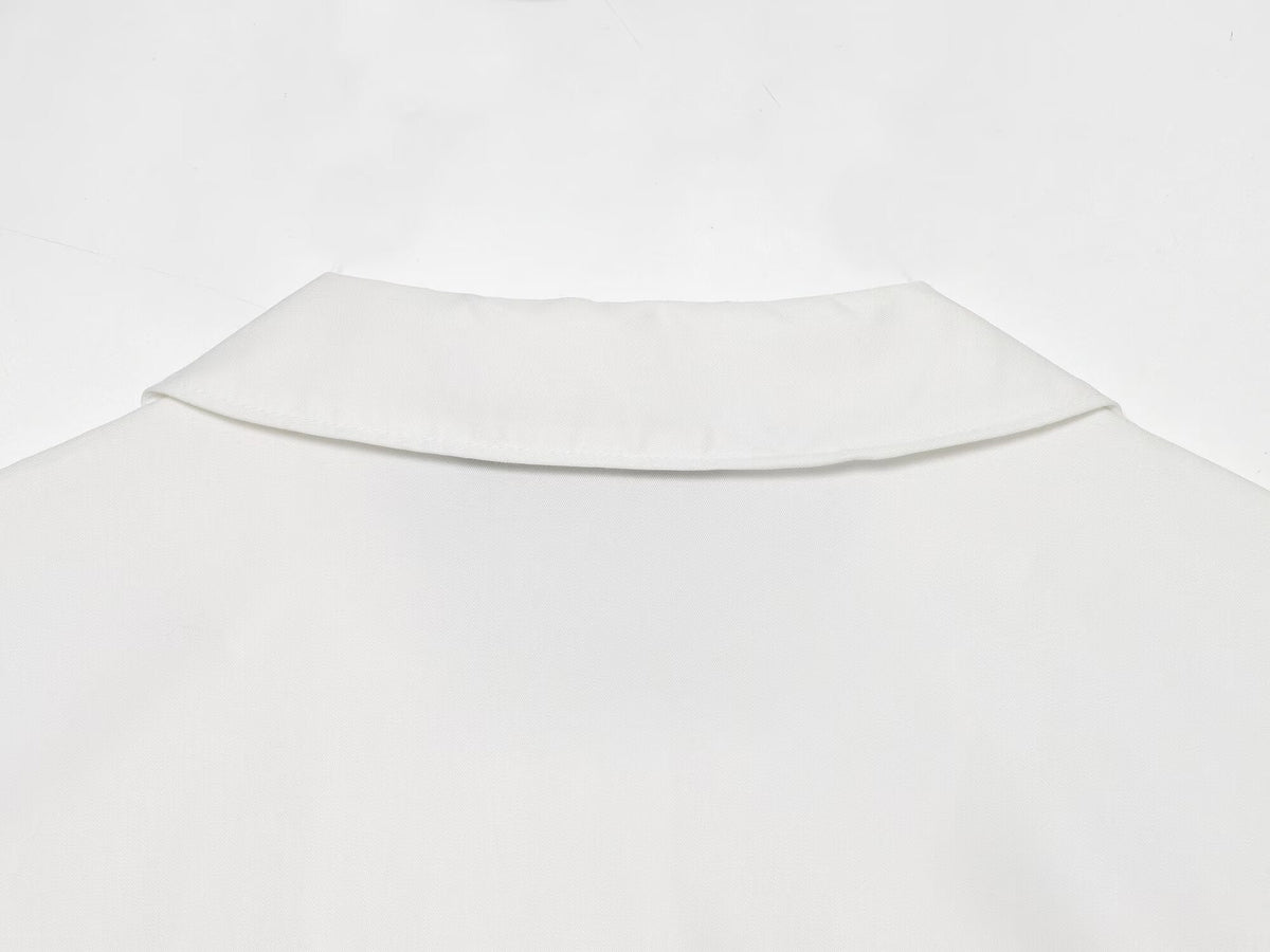 Women's breasted decorative sleeveless lapel top