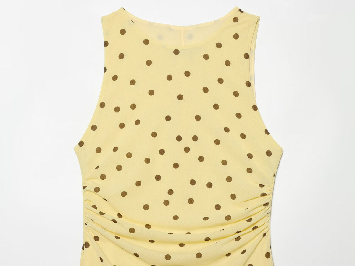Women's sleeveless polka dot draped dress
